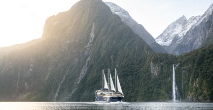 Scenic cruise in Milford Sound with waterfalls and mountains